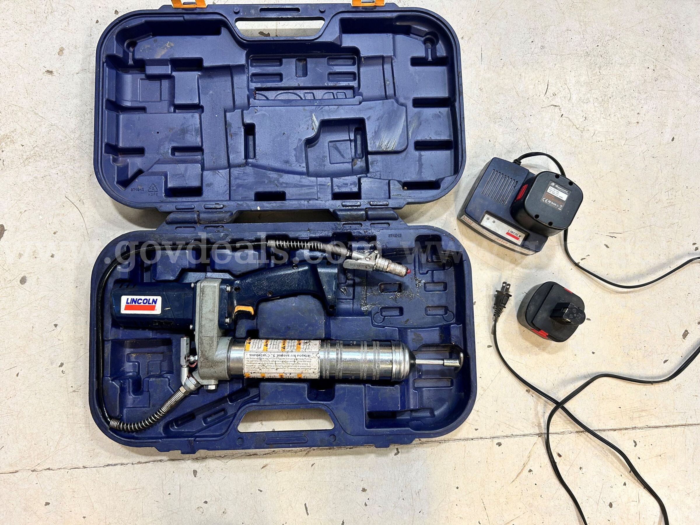 Cordless grease gun Lincoln 1200 Power Luber  series B Government Surplus Auction - Primary Photo
