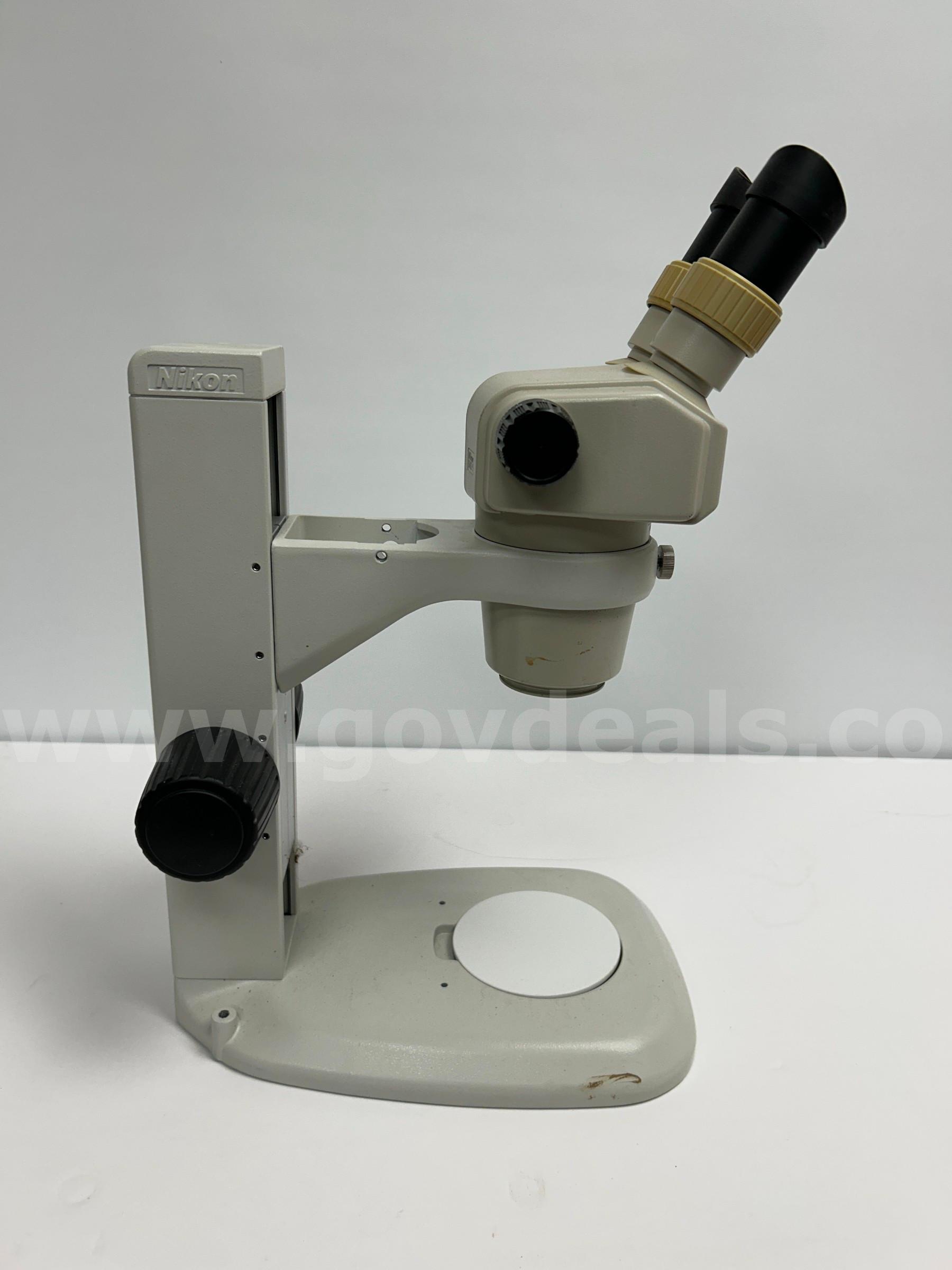 Nikon Binocular Stereo Zoom Microscope with Heavy-Duty Track Stand Nikon  Government Surplus Auction - Primary Photo