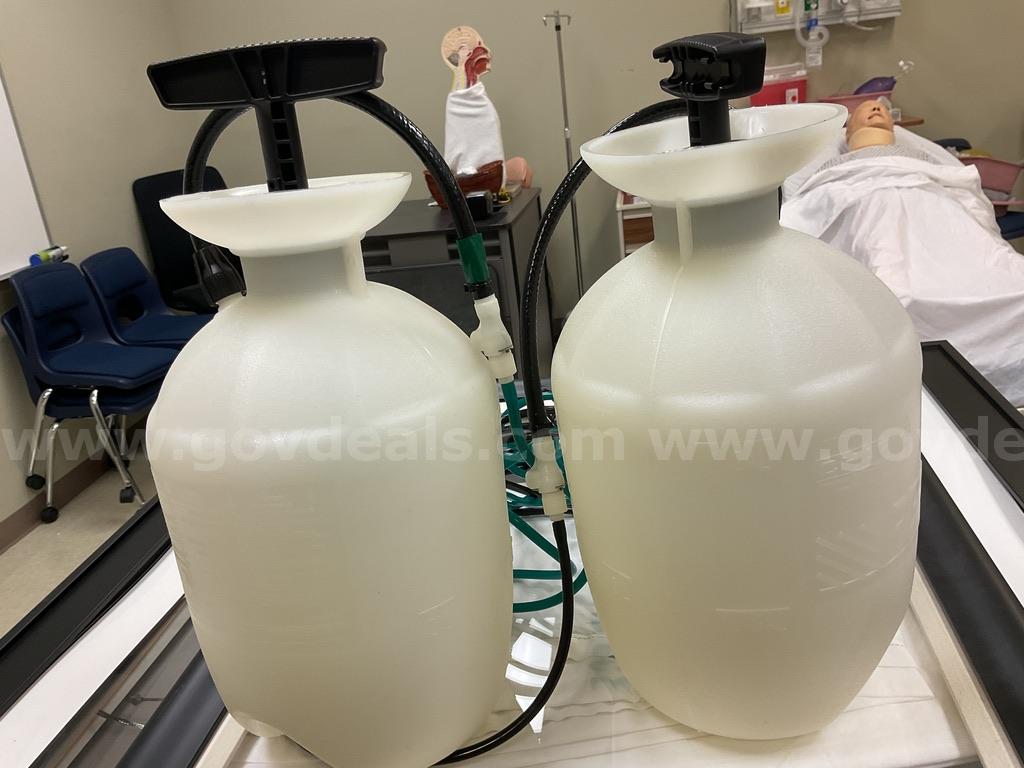 Two Large Plastic Connected Bottles   Government Surplus Auction - Primary Photo