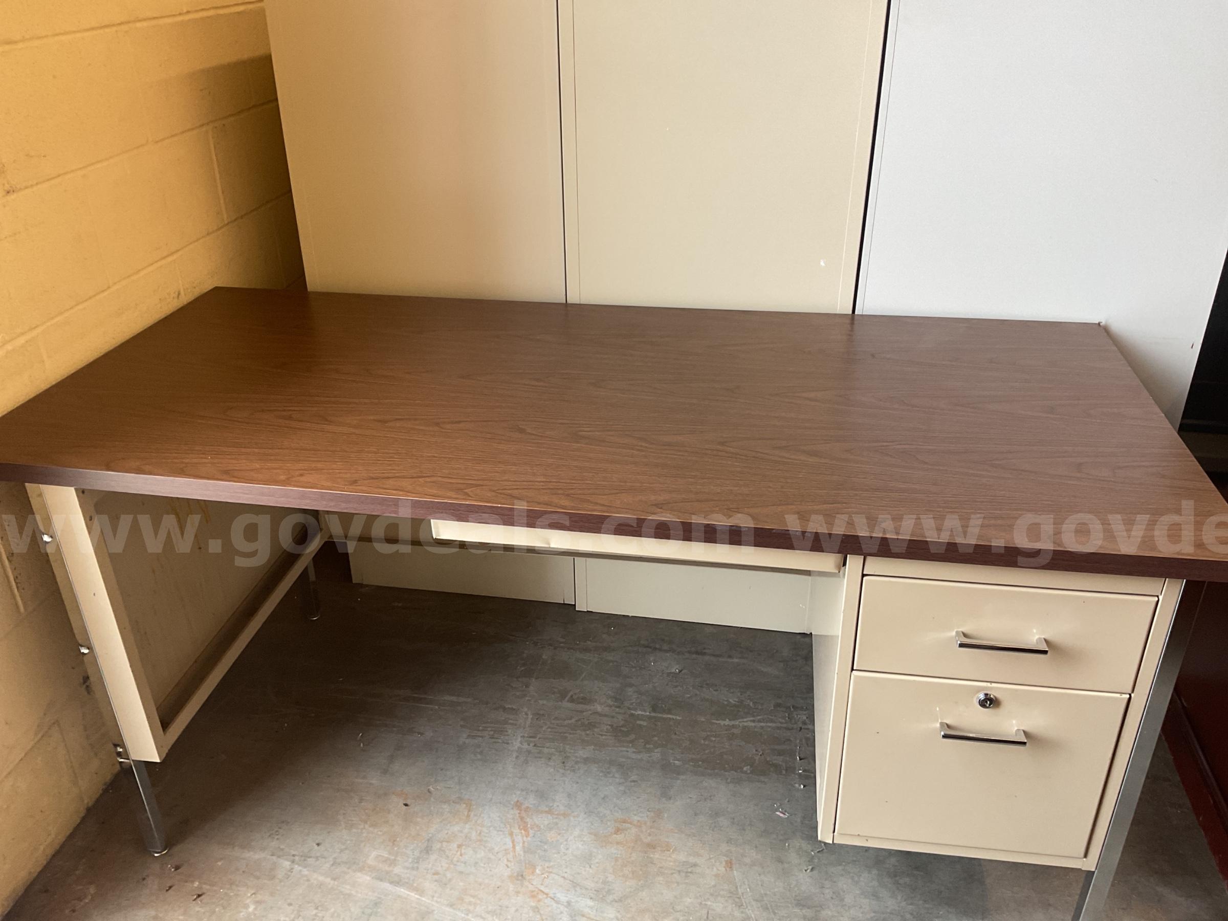 Beige desk with wooden top   Government Surplus Auction - Primary Photo