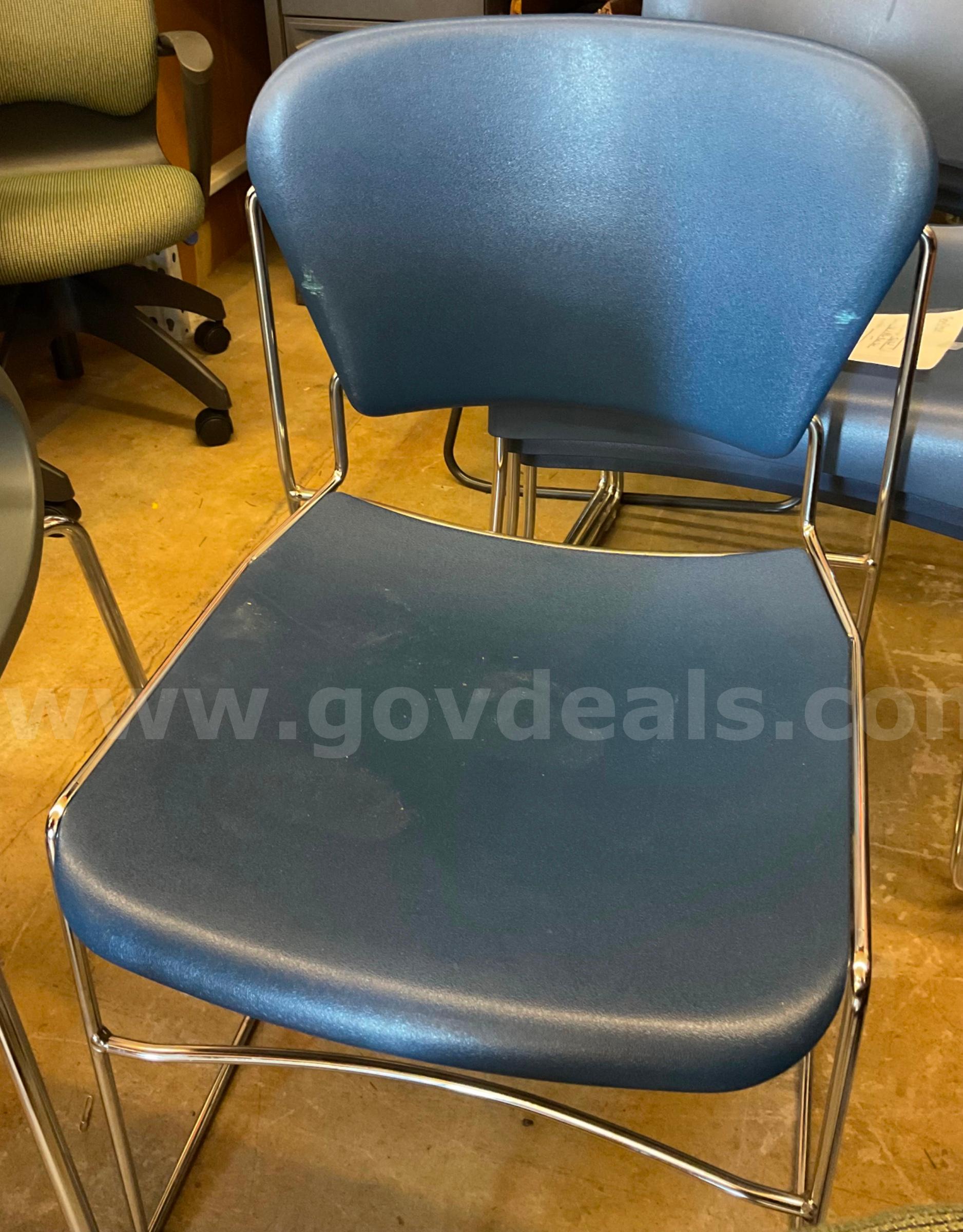 Blue plastic chair   Government Surplus Auction - Primary Photo