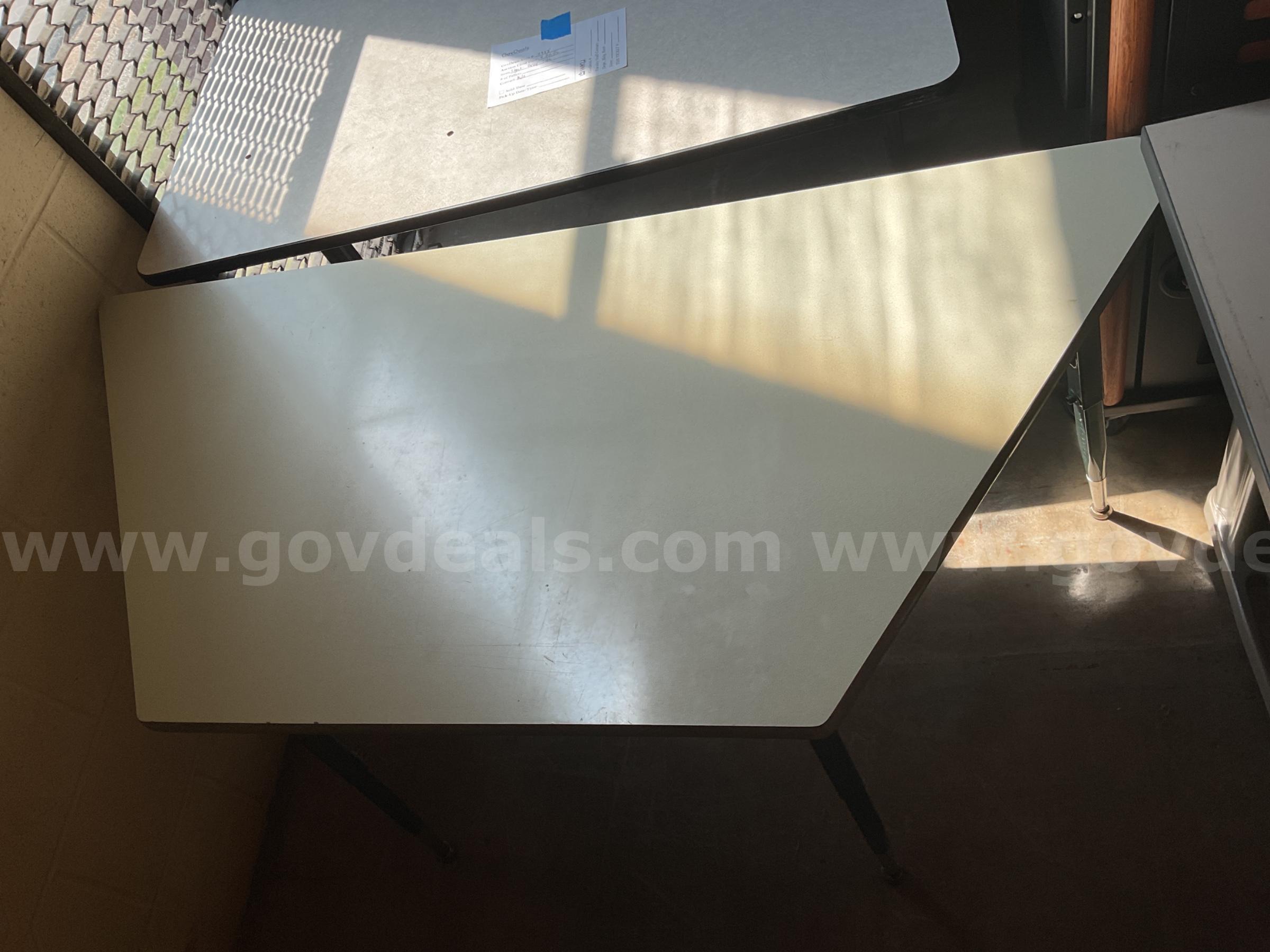 Tan Trapezoid shaped table   Government Surplus Auction - Primary Photo