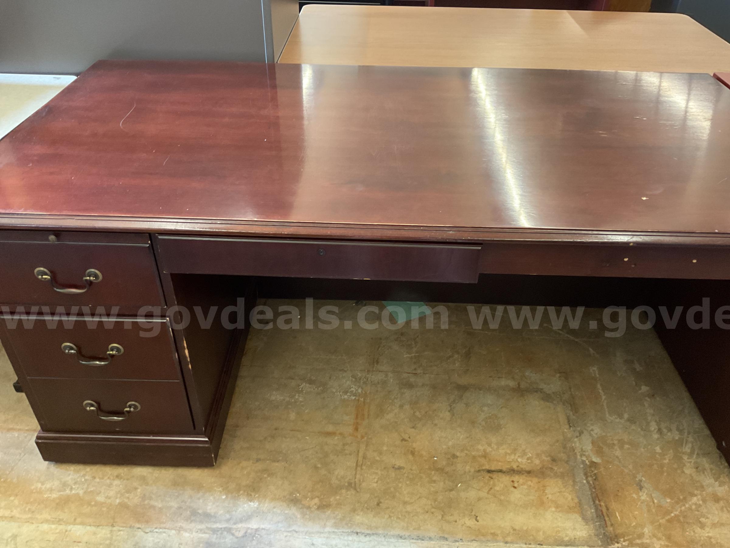 Brown wooden desk   Government Surplus Auction - Primary Photo
