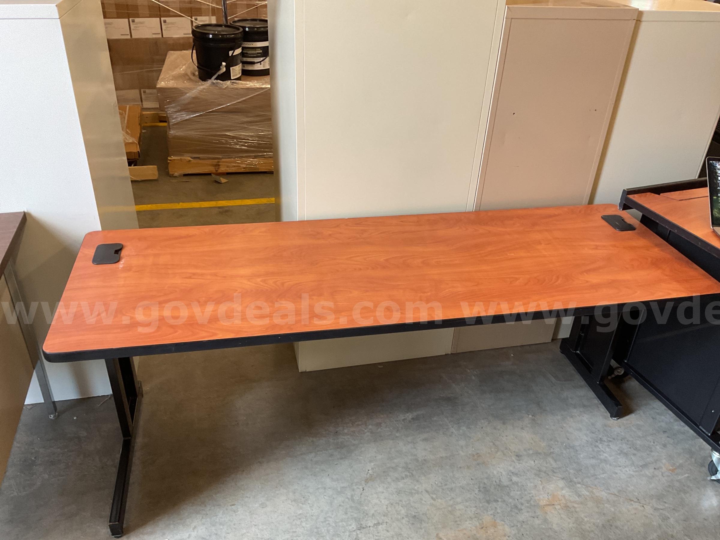 Long wooden office desk   Government Surplus Auction - Primary Photo