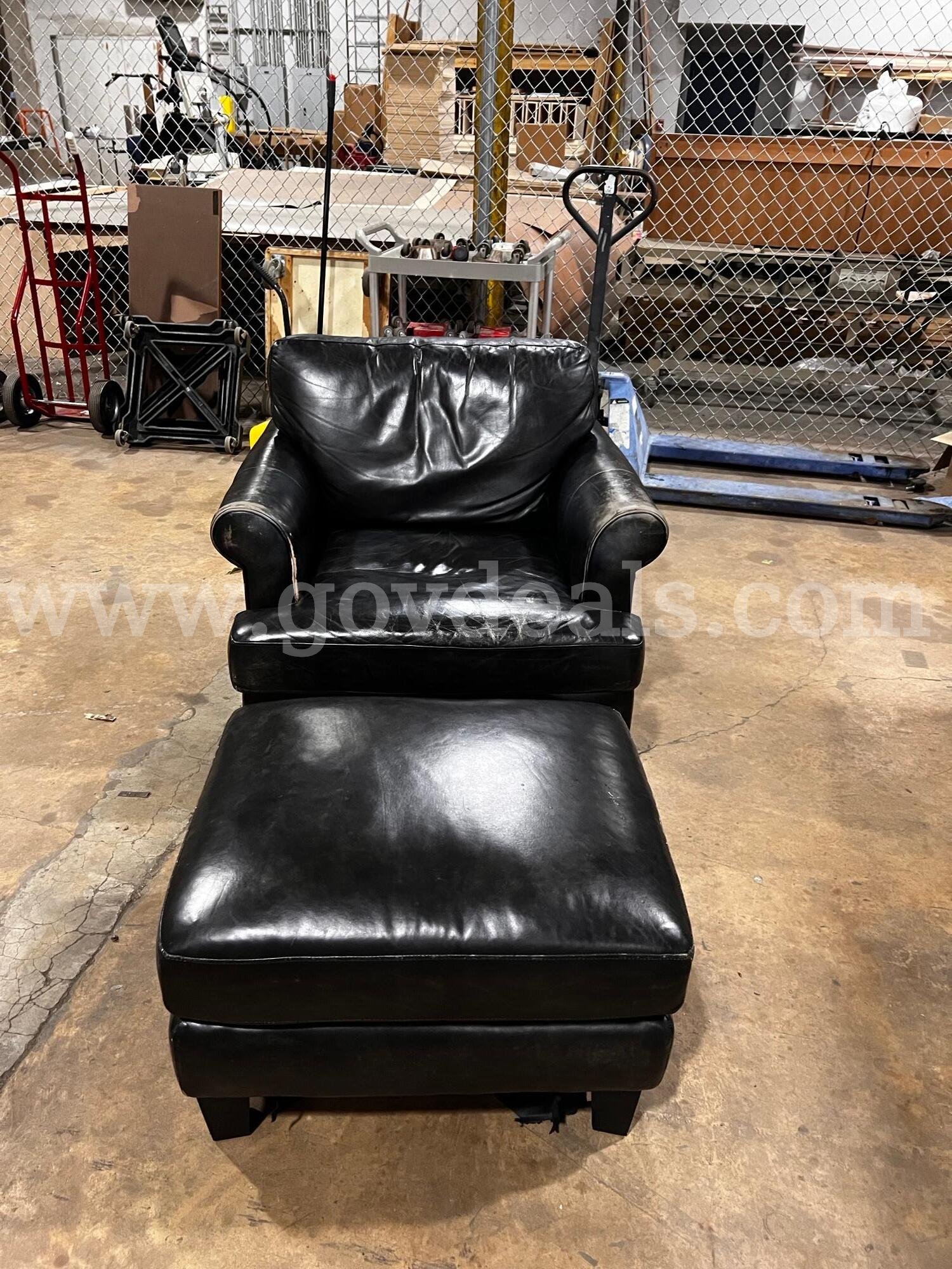 Black Leather Chair with Matching Footrest   Government Surplus Auction - Primary Photo