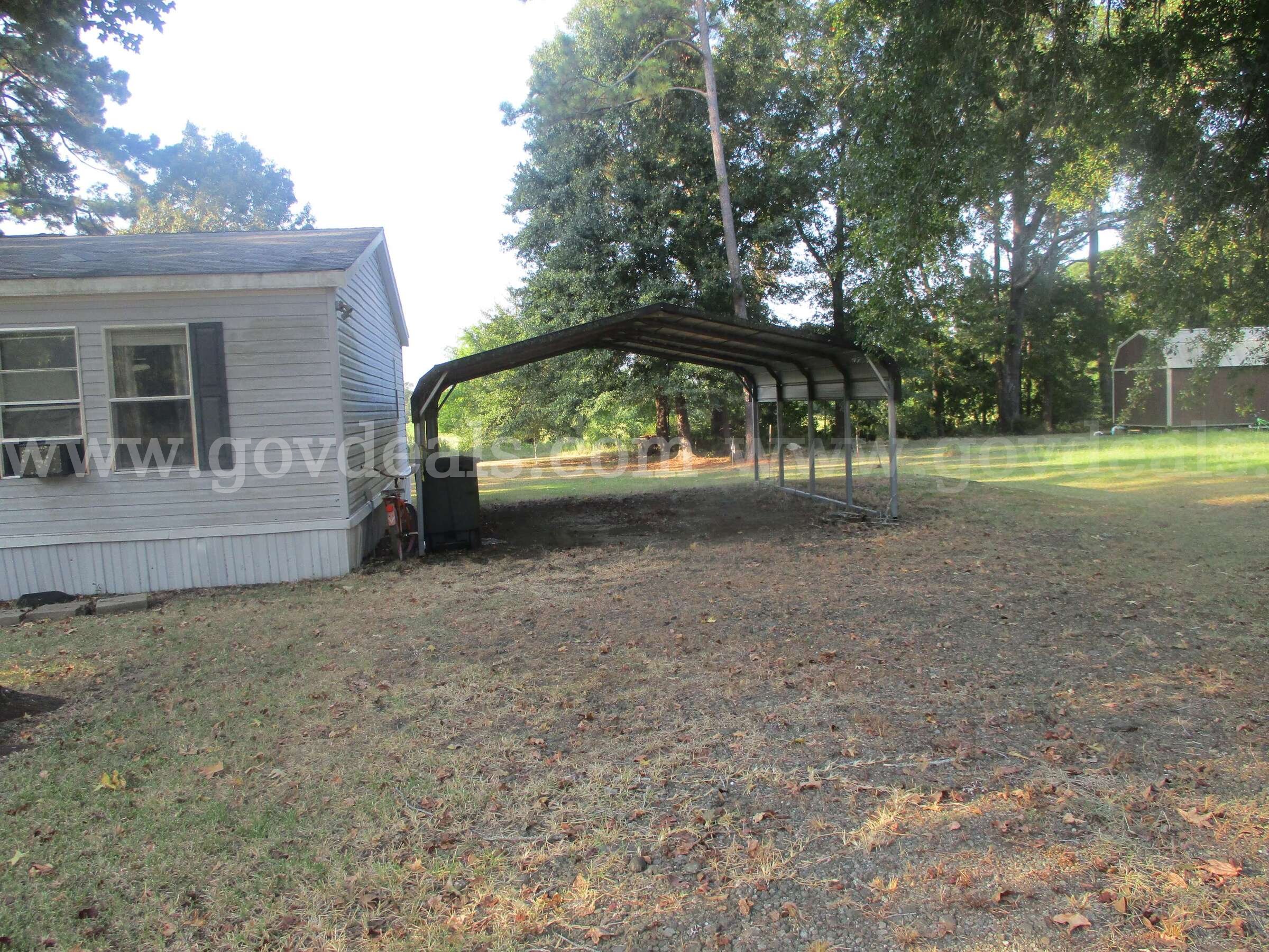 A Double Wide mobile home on 03.29 acres LGACY LGACY/LH325642SBLESS Government Surplus Auction - Photo #3