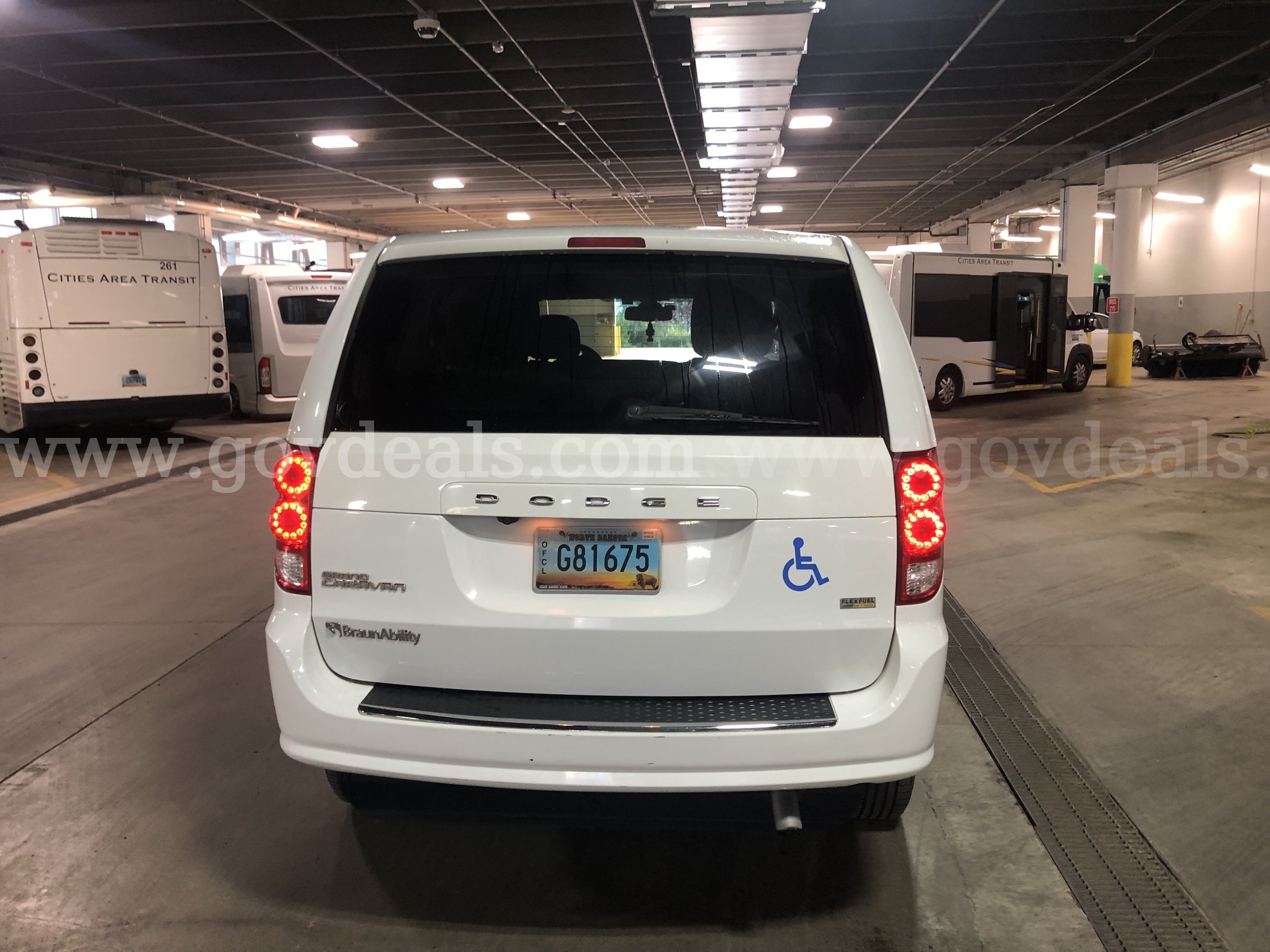 2019 White Dodge Caravan(Entervan), Wheelchair accessible with a manual pull out ramp. In Good condition. Dodge Caravan(Entervan) Government Surplus Auction - Photo #5