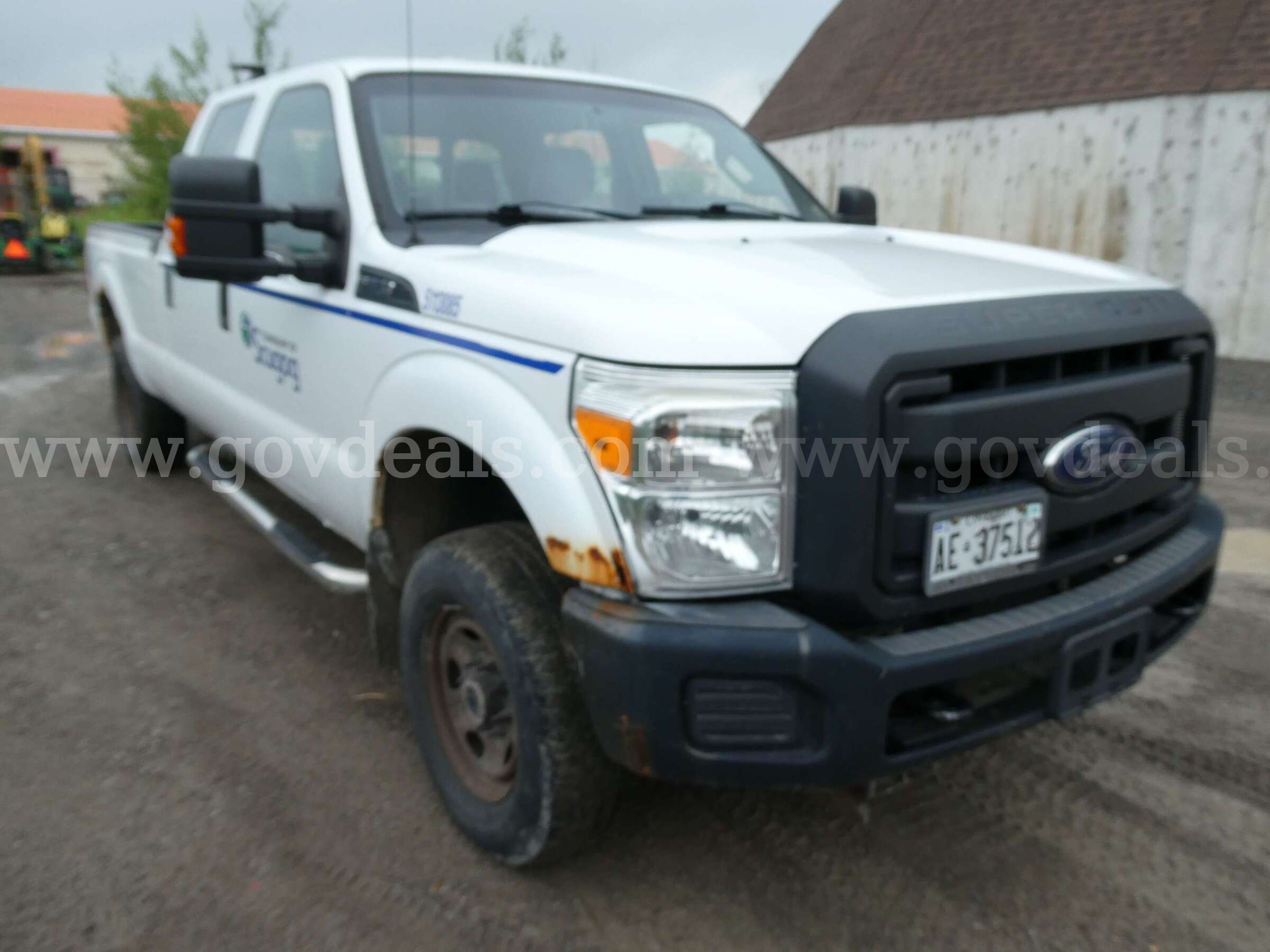 2013 Ford F-250 White Super Duty Crew Cab Long Bed 4WD Ford F-250 Government Surplus Auction - Primary Photo