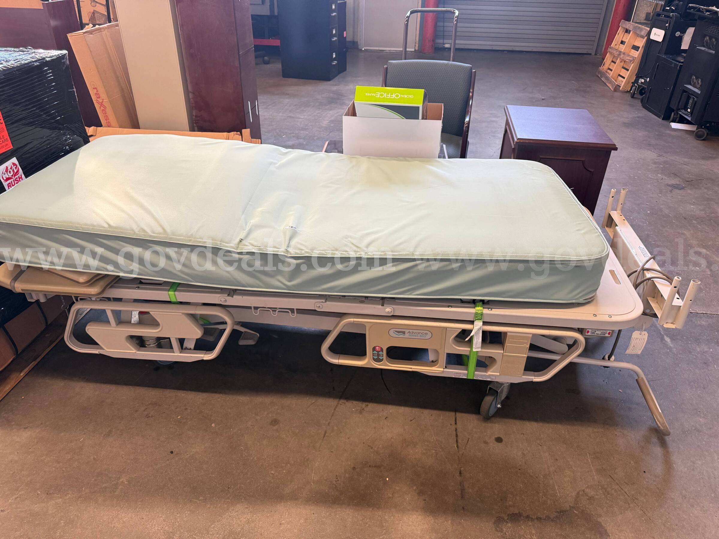 Hillrom Advance Series Hospital Bed with Mattress and Side Rails Hill-Rom 1000 Government Surplus Auction - Primary Photo