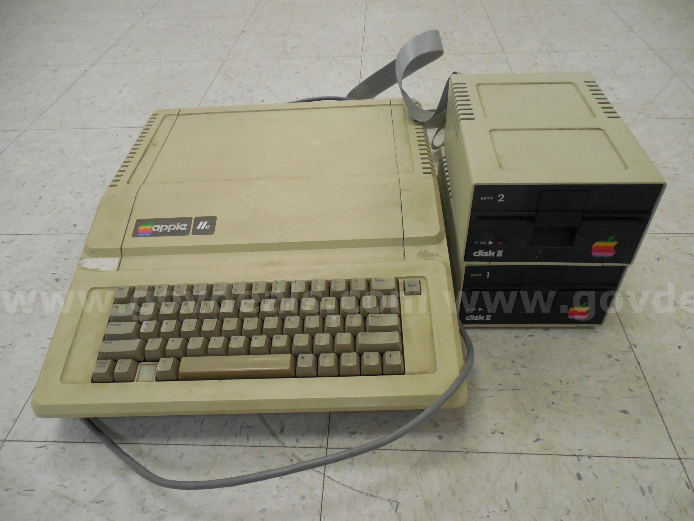Apple lle with two attached floppy drives