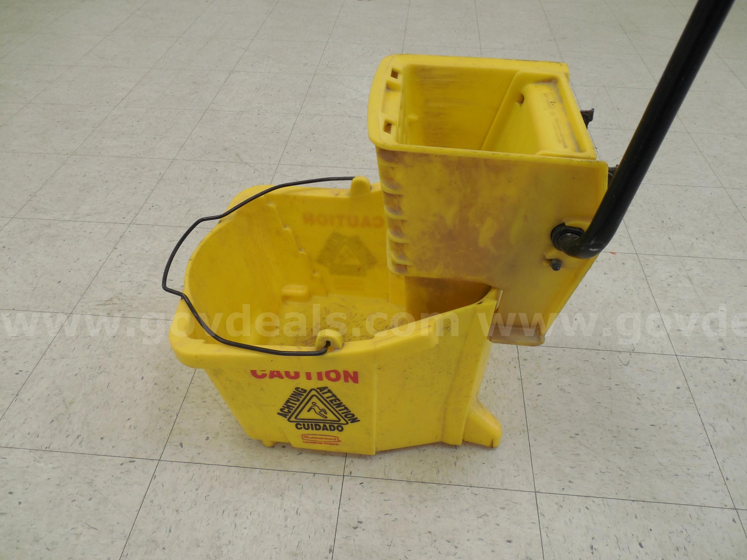 Damaged mop bucket   Government Surplus Auction - Photo #4