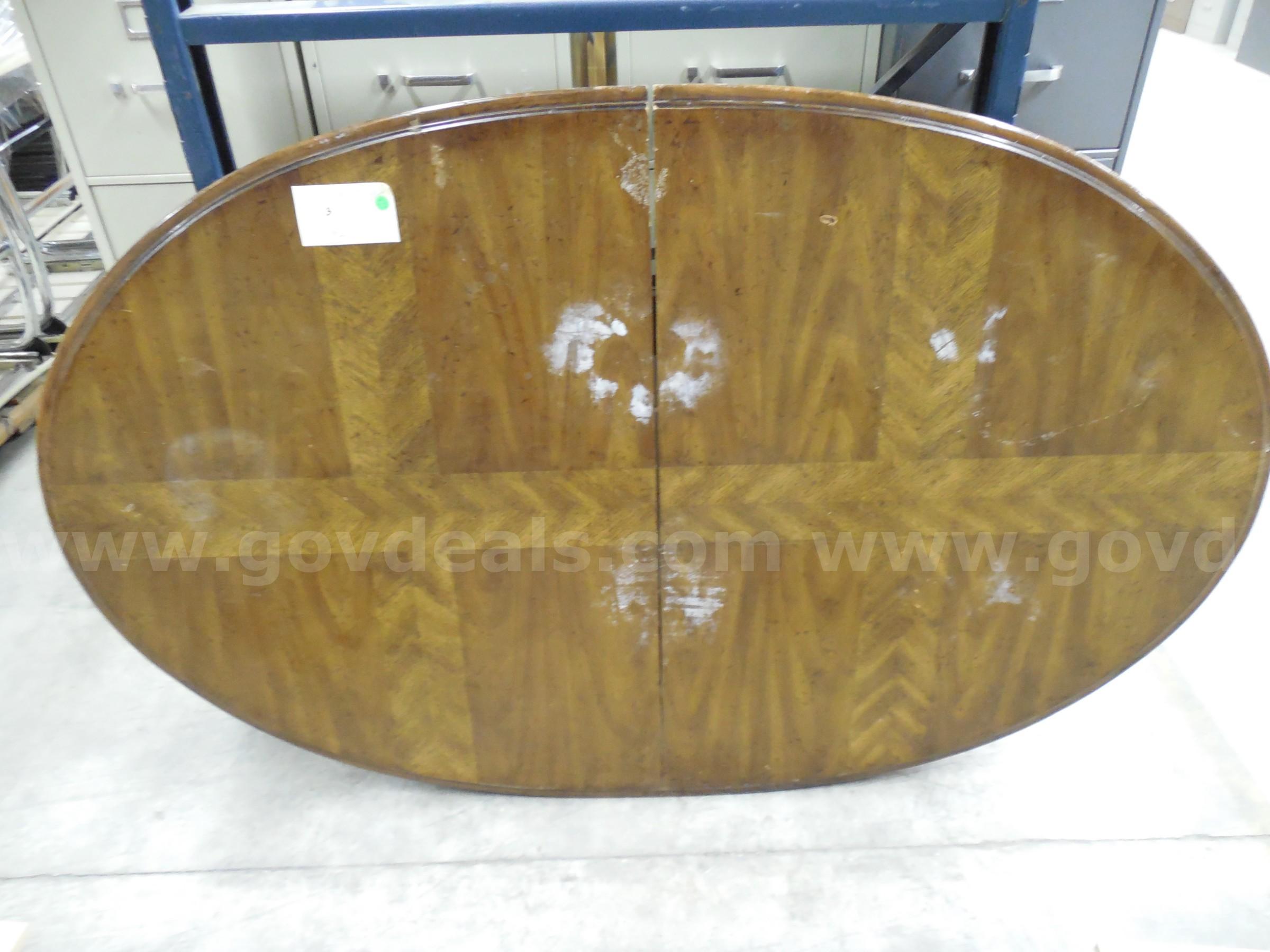 Solid wood expandable dining room table with set of 12 matching chairs