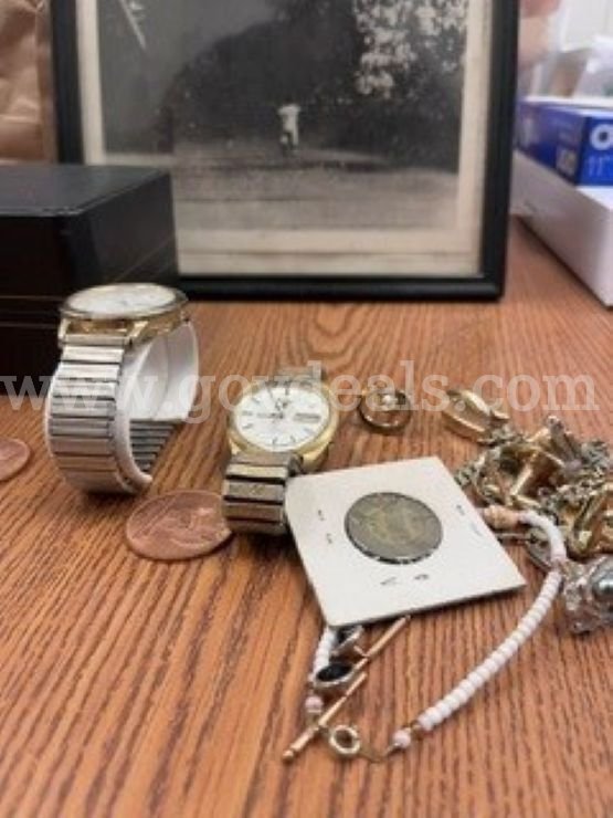 1 Small lot containing: 2 watches, cuff links, 1 necklace, 1 bracelet, and a framed photo of "The Catch"   Government Surplus Auction - Photo #2