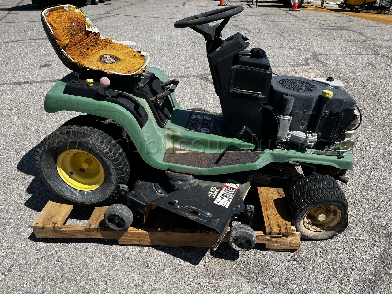 LOT - 112E John Deere riding lawn mower