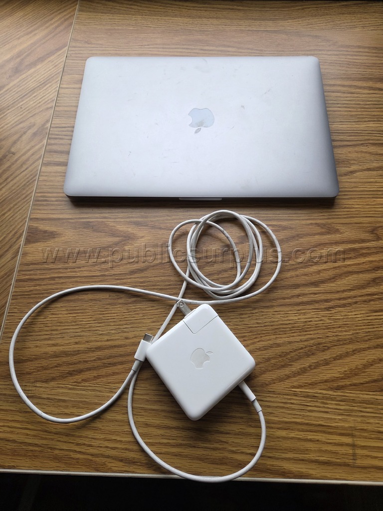 (1) MacBook Pro with Charger