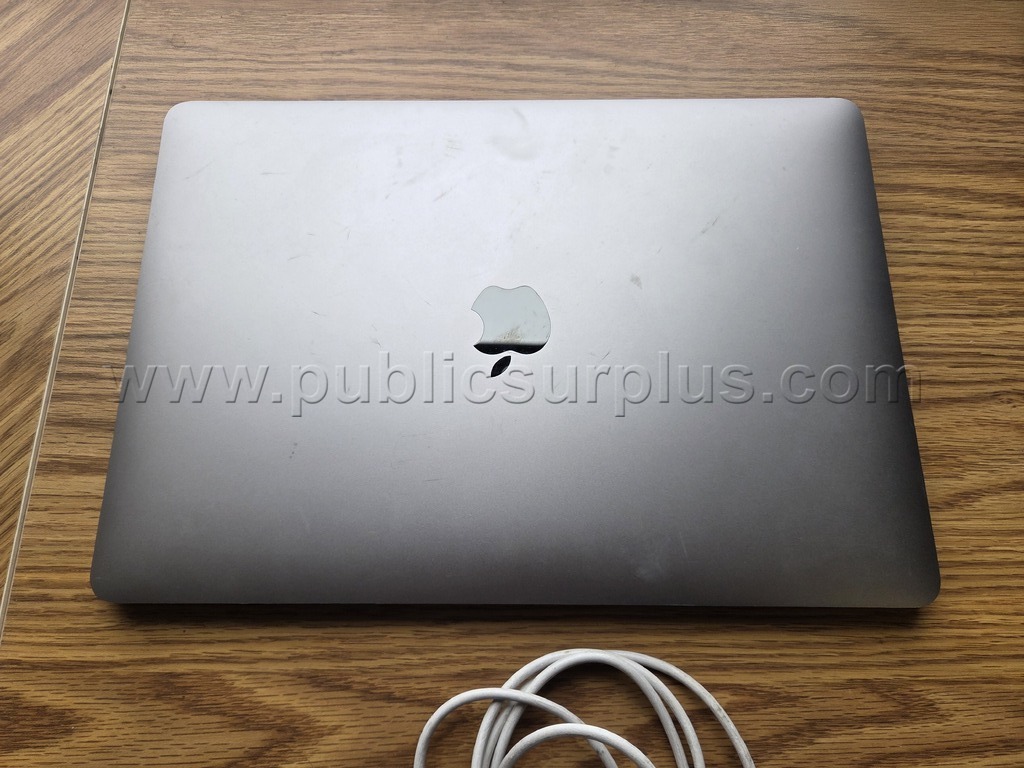 (1) MacBook Pro with Charger Dodge Charger Government Surplus Auction - Photo #2