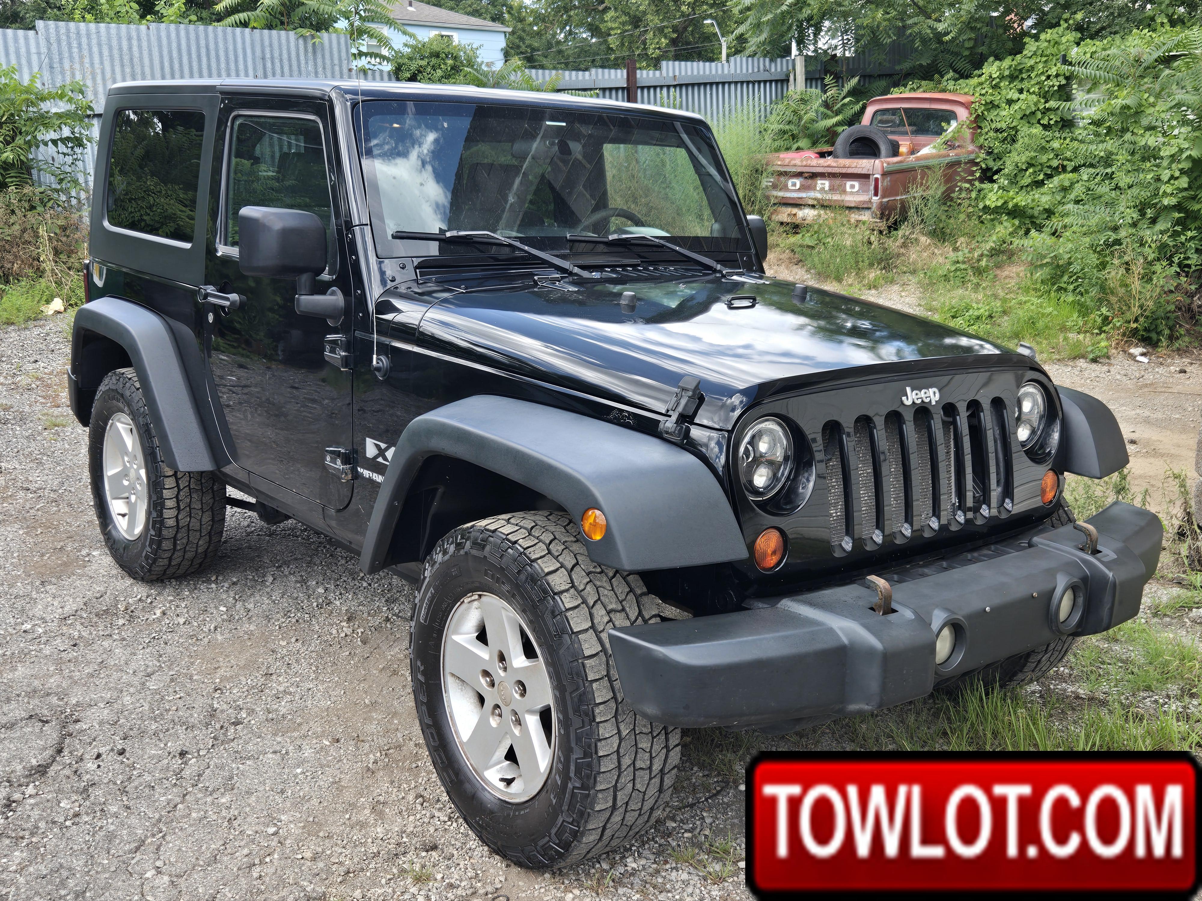 2009 Jeep Wrangler X 4X4 (Kansas City, Missouri) Jeep Wrangler X 4X4 Government Surplus Auction - Photo #2