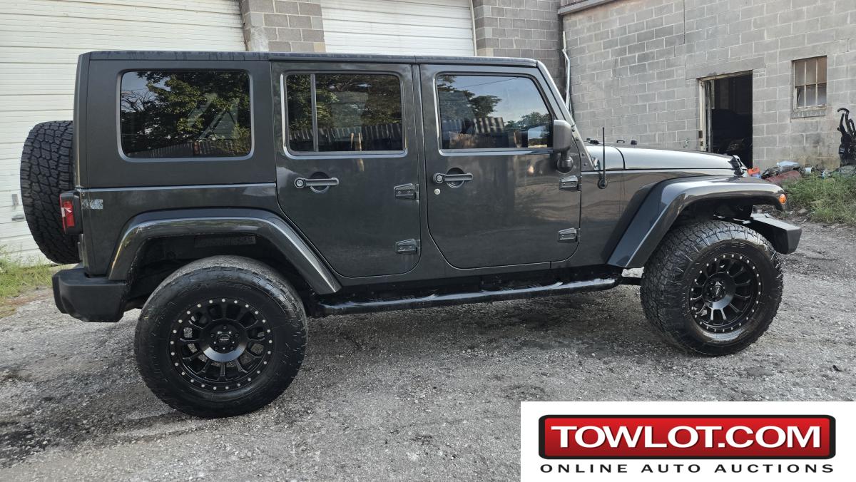 2010 Jeep WRANGLER UNLIMITED SAHARA (Kansas City, Missouri) Jeep WRANGLER UNLIMITED SAHARA Government Surplus Auction - Photo #4